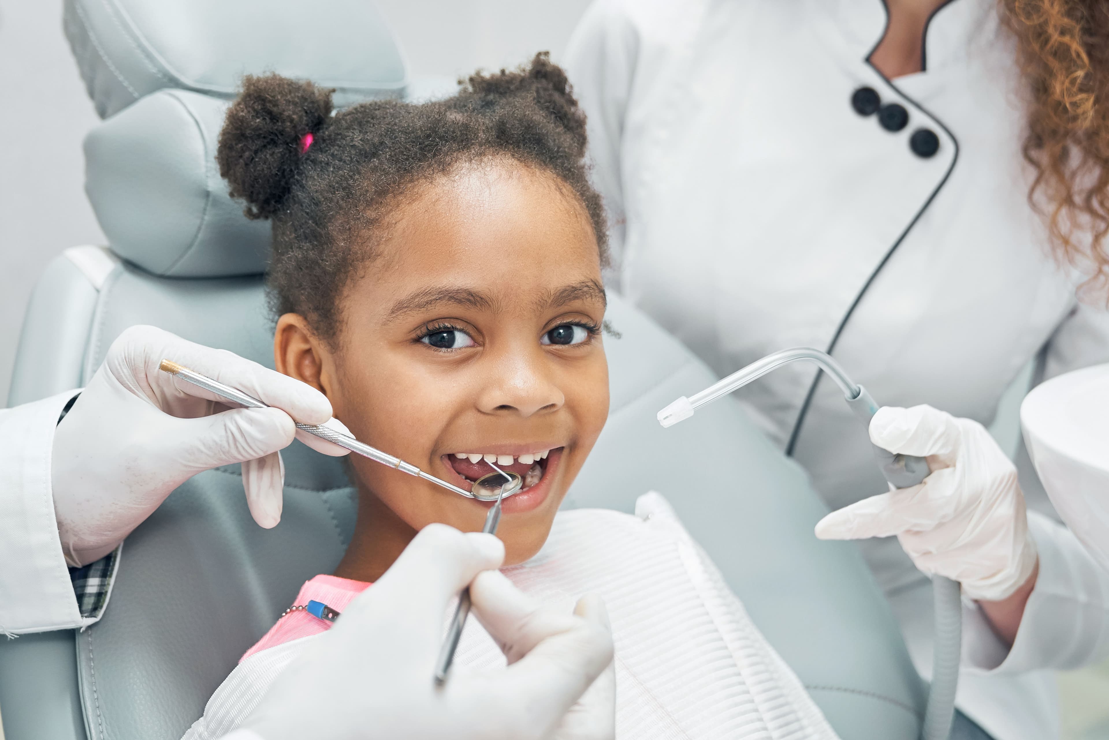 Child smiling in dental clinic